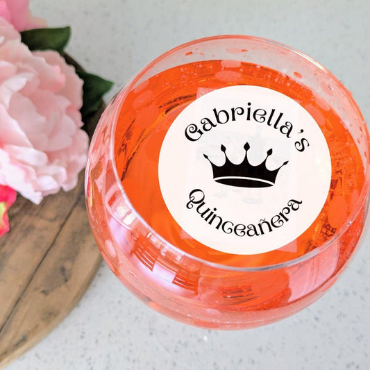 Drink Topper 'Gabriella's Quinceanera' label on a light background