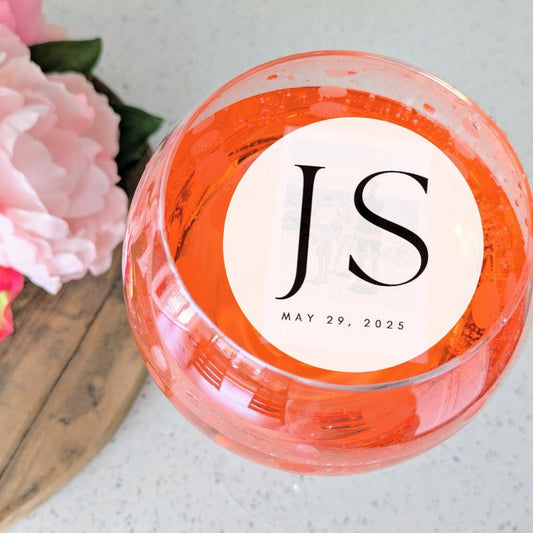 Personalized drink topper with initials 'JS' and date 'May 29, 2025' on a white background with pink flowers.